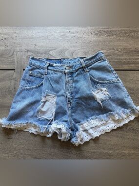 Levi's Light Blue Distressed Denim Shorts with White Eyelet Hem